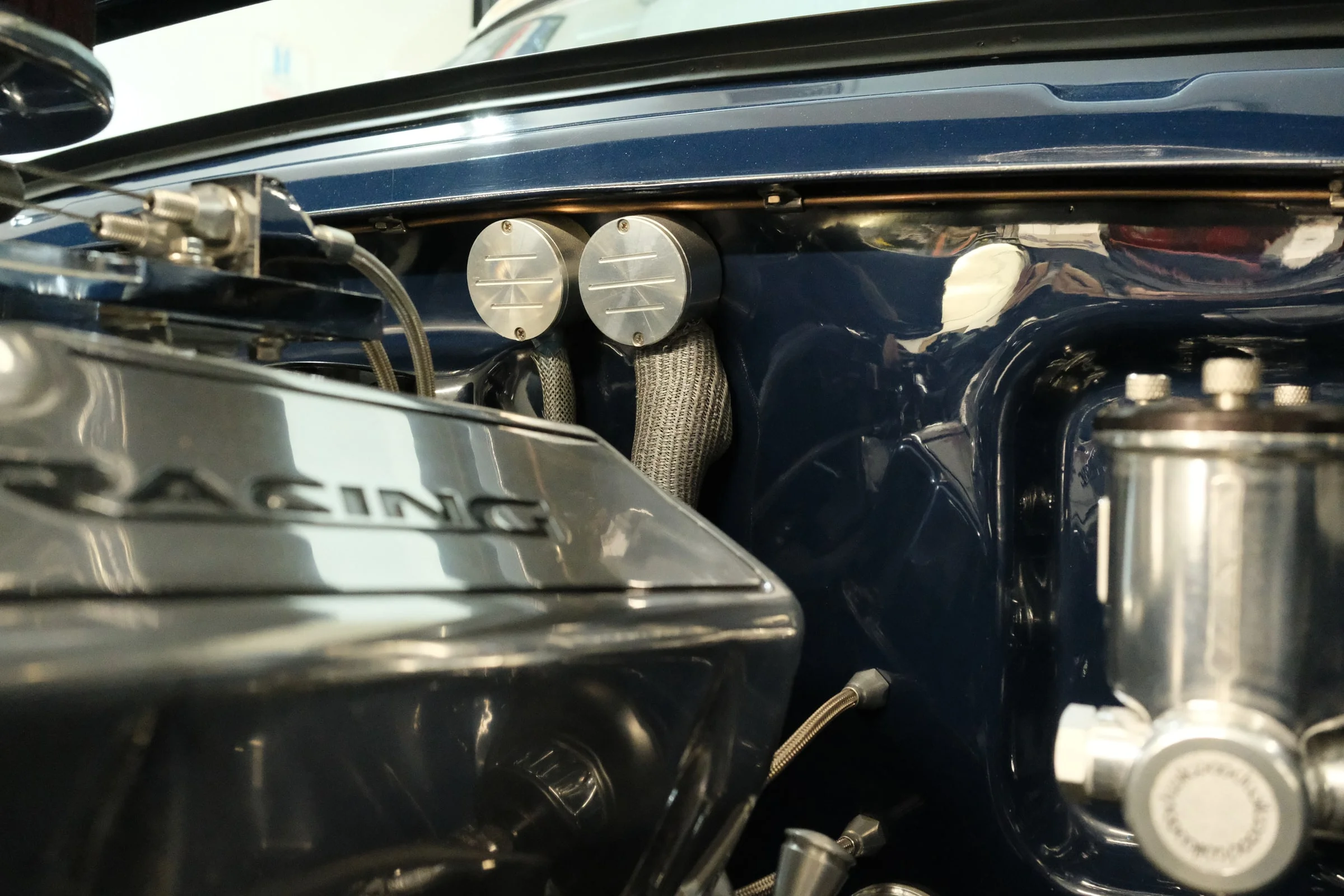 Hidden brake line under cowl